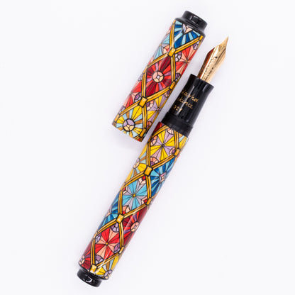 An overhead view of the AP Limited Editions Imperial Lacquer Art Fountain Pen - Tiffany uncapped, with the cap next to the body angled towards the right.
