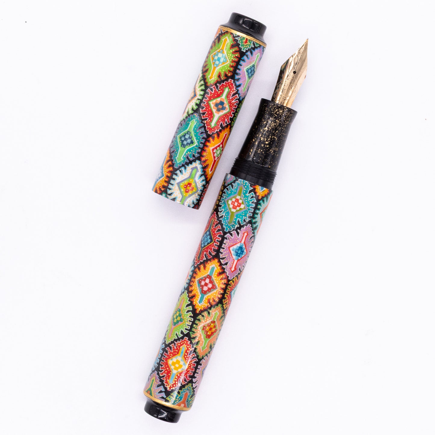 An overhead view of the AP Limited Editions Imperial Lacquer Art Fountain Pen - Tutankhamen uncapped, with the cap next to the body angled towards the right.