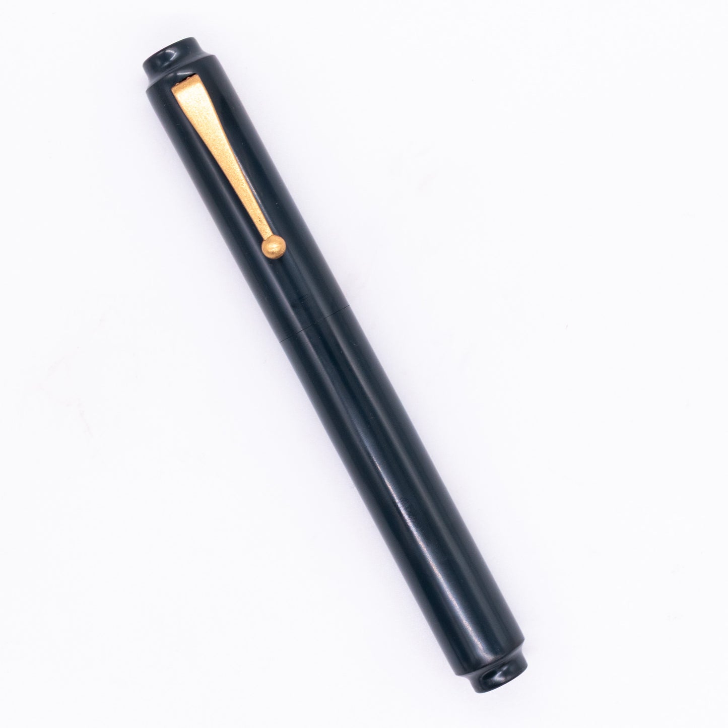 An overhead view of the AP Limited Editions Urushi Lacquer Art Fountain Pen - Konkikyo capped, angled towards the left.