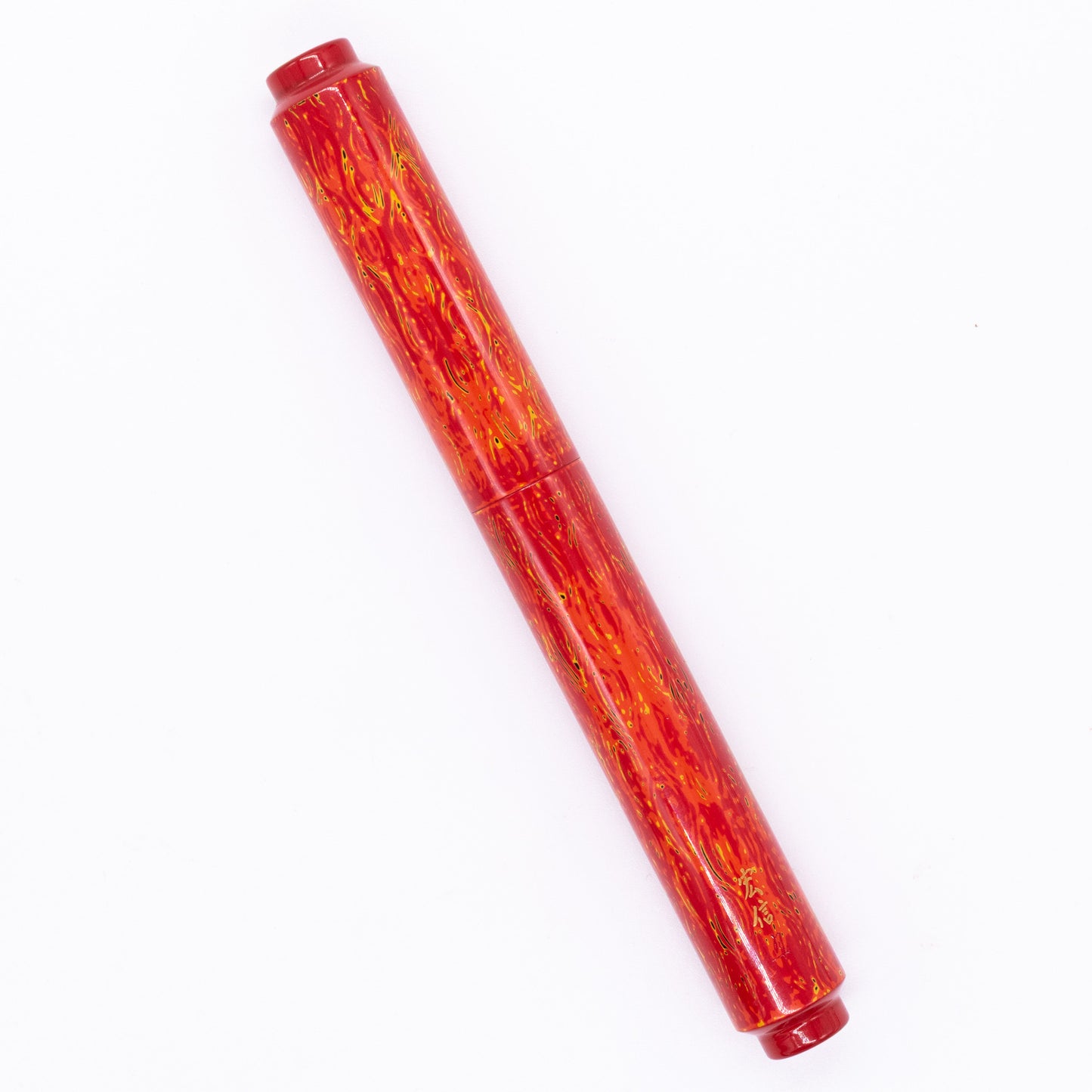 An overhead view of the AP Limited Editions Urushi Lacquer Art Fountain Pen - Red Earth capped, angled towards the left.