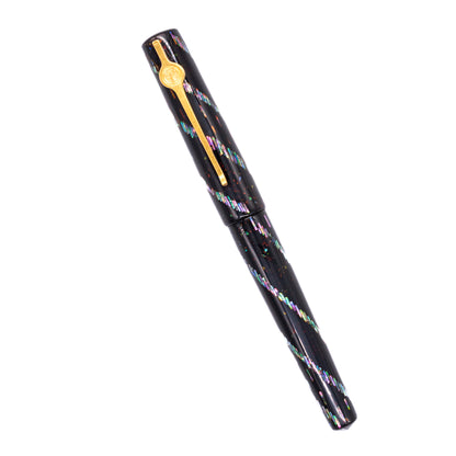 An overhead view of the ConCoPens Traditional Vietnamese Lacquer Fountain Pen - Ocean Serenade capped, angled towards the left.