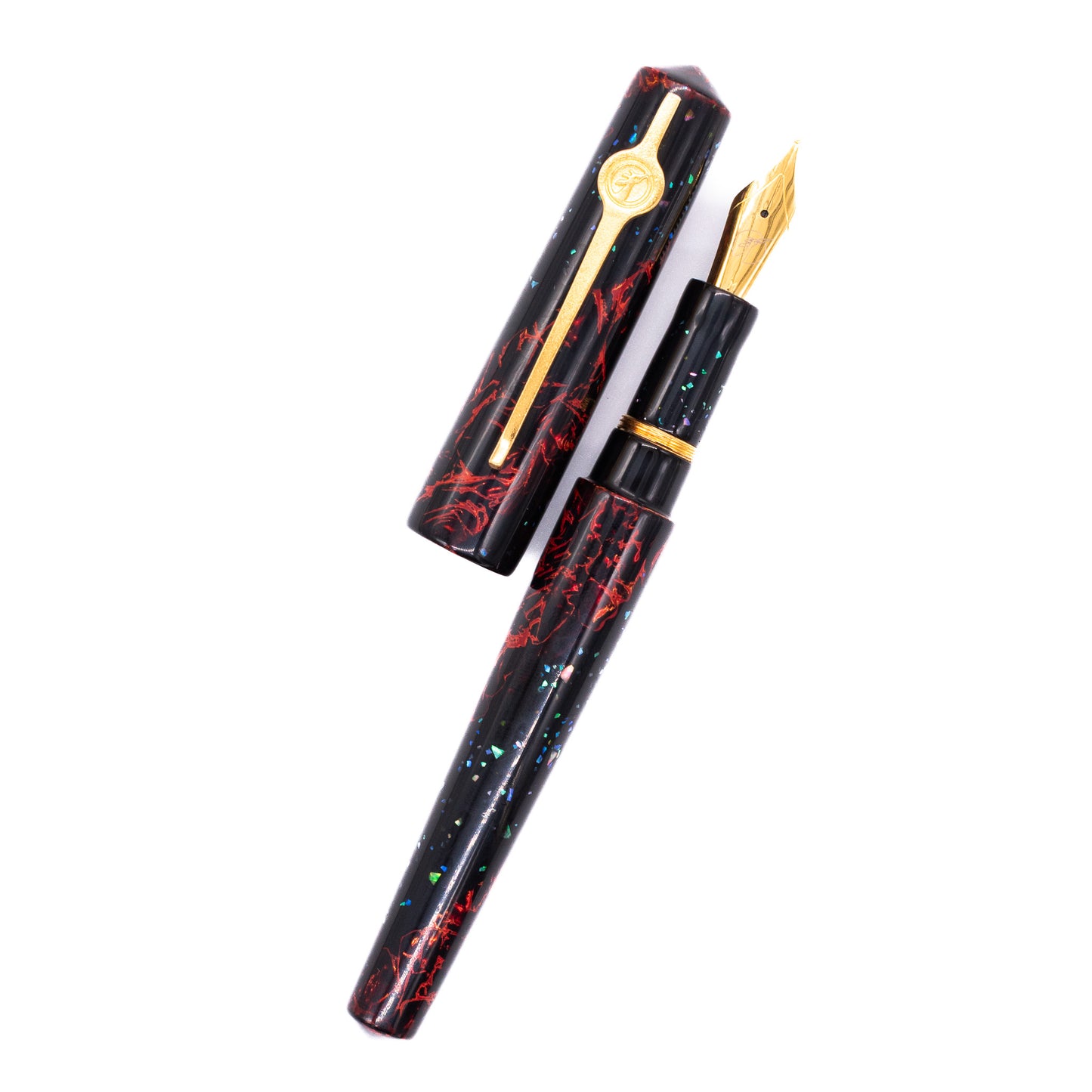 An overhead view of the ConCoPens Traditional Vietnamese Lacquer Fountain Pen - Inferno uncapped, with the cap next to the body angled towards the right.