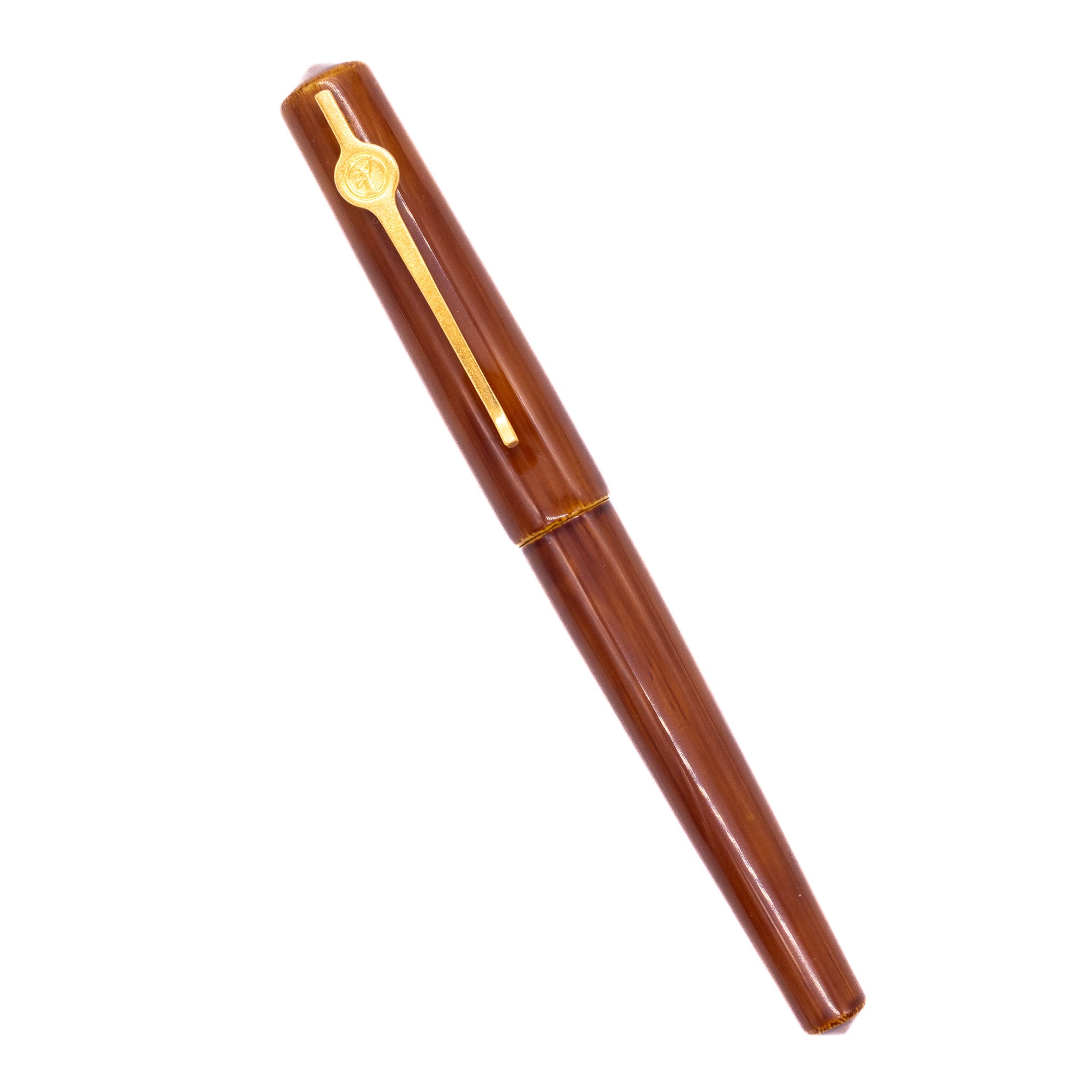 An overhead view of the ConCoPens Traditional Vietnamese Lacquer Fountain Pen - Moc Brown capped, angled towards the left.