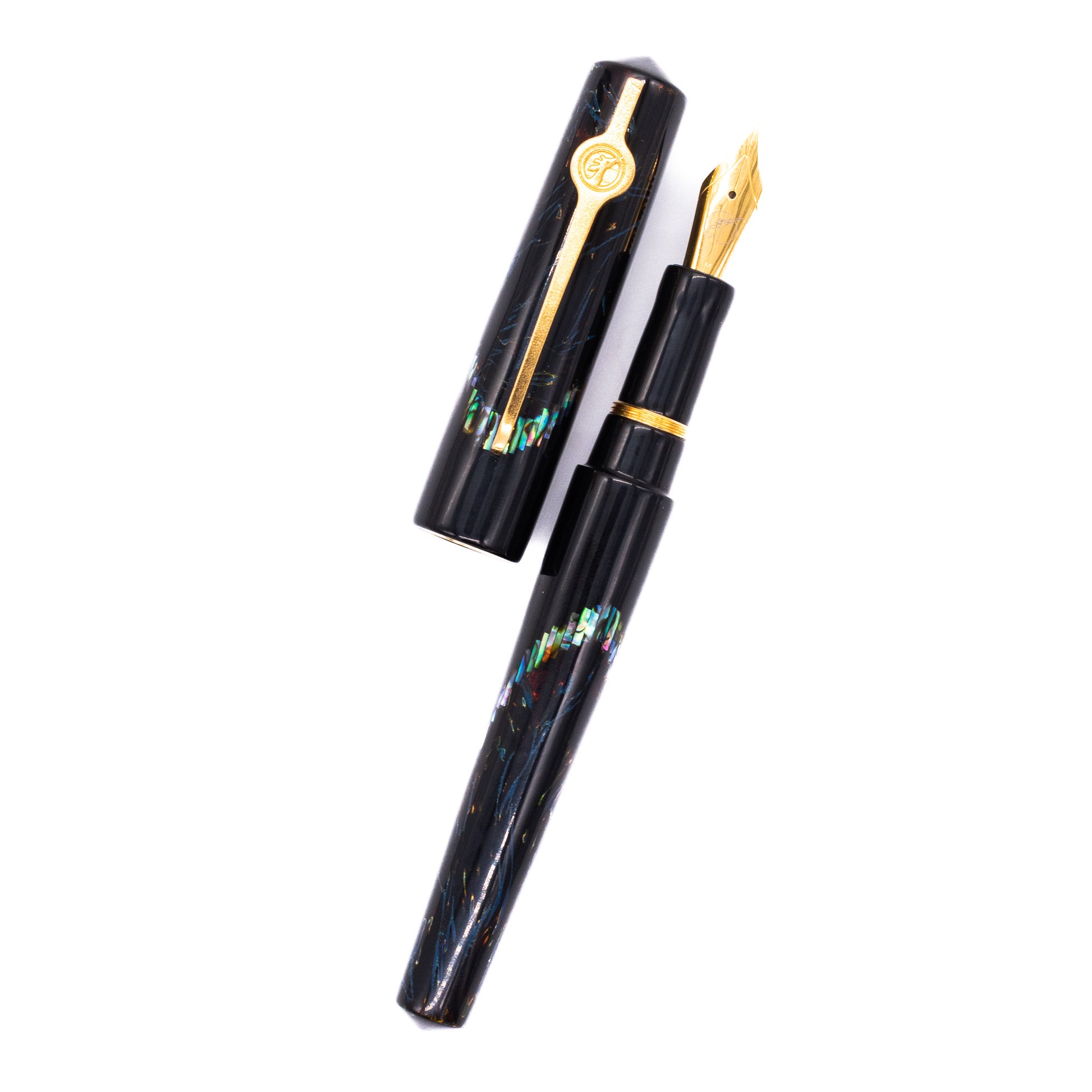 An overhead view of the ConCoPens Traditional Vietnamese Lacquer Fountain Pen - Ocean Serenade uncapped, with the cap next to the body angled towards the right.
