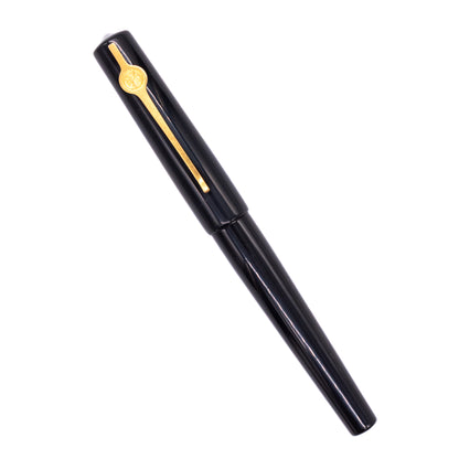 An overhead view of the ConCoPens Traditional Vietnamese Lacquer Fountain Pen - Then capped, angled towards the left.
